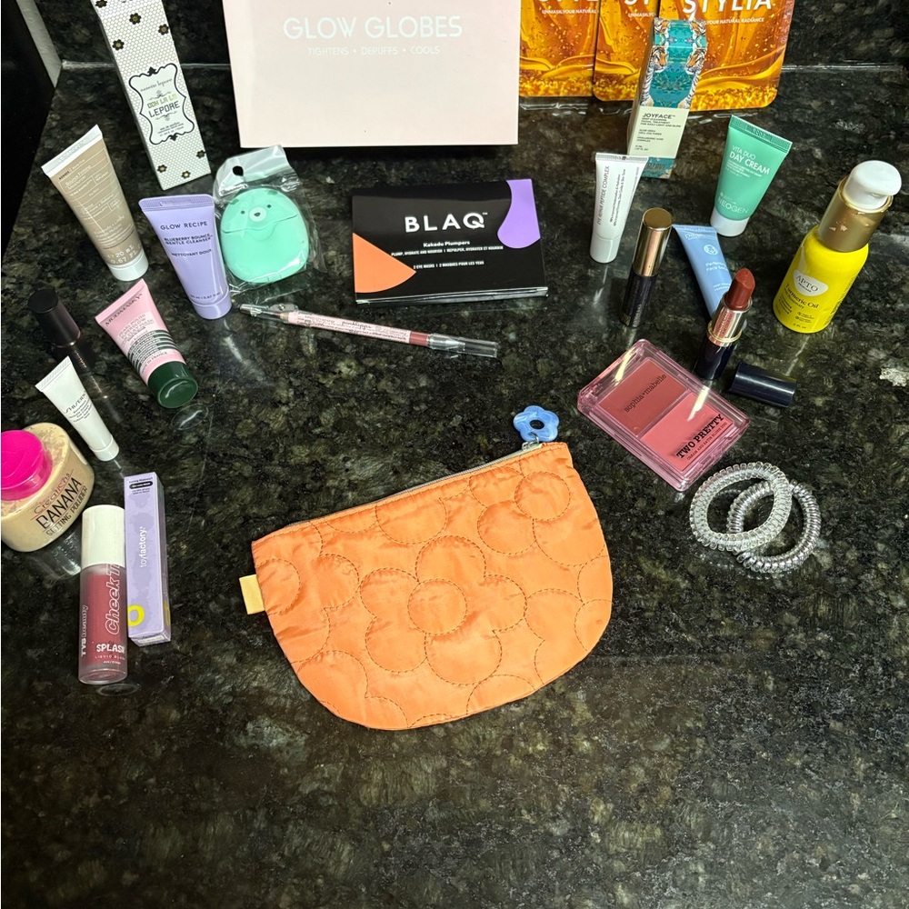 NWOT Orange Quilted Mystery Bag with Assorted Cosmetics